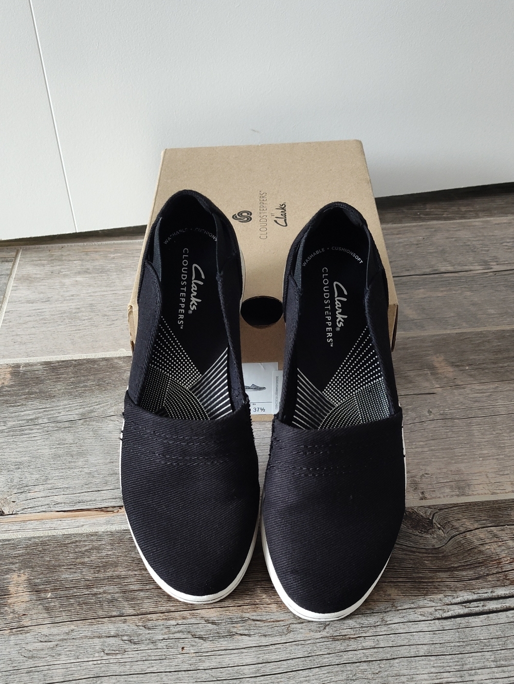 Cloudsteppers by Clarks Black Slip-On Flats